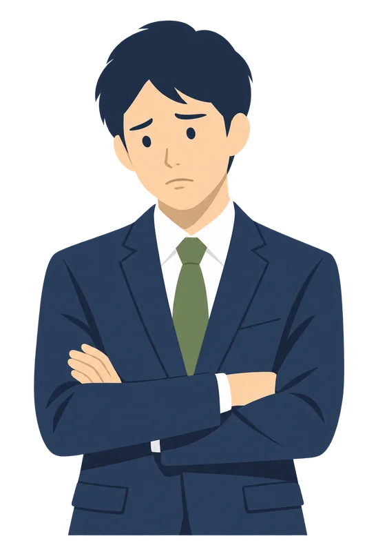 退職届を受け取ってもらえず、腕を組んで困っているスーツ姿の男性会社員
